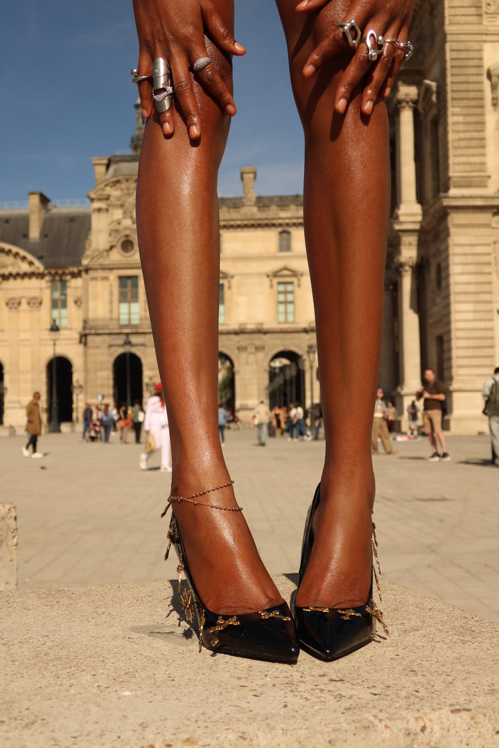 “Noir Relic” Pumps